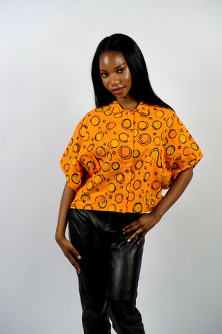 Bewusst locker geschnittene 80s Baumwollbluse in Orange mit tollem Kreise Print – von uns gecropped – tragbar von L bis XL und ein absolutes Highlight