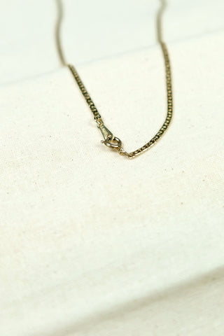 Gliederkette aus den 70s/80s mit gedrehtem Barren-Design, eher kurz, vermutlich Modeschmuck/vergoldet