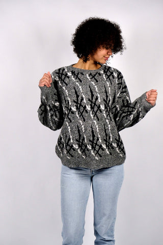 Grau melierter 80s/90s Pullover made in UK mit Rundhalskragen und Crazy Pattern in Schwarz und Weiß – Größe M und unisex tragbar