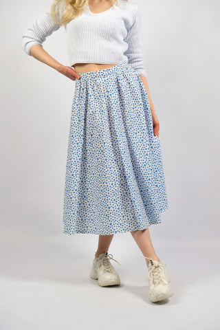 Weißer 70s High Waist Baumwollrock in A-Linie mit Blümchenmuster in Blau, ideal für eine XS