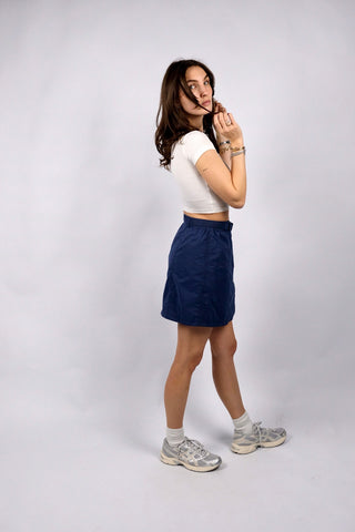 Dunkelblauer 90s Tennisrock von Killtec mit Knopfleiste vorn, stretchy Gummizugbund und Gürtel – entspricht ca. einer heutigen XS/S (bitte Maße beachten) – ein absolutes Highlight