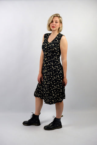 Schwarzes, ärmelloses 90s Viskose Kleid mit durchgehender Knopfleiste, Band zum Binden am Rücken und geometrischem Muster in Creme/Beige – ideal für eine L
