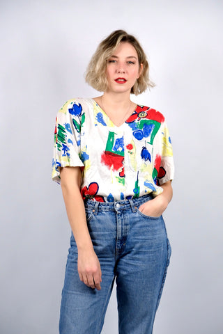 Weiße 90s Bluse aus reiner Viskose mit Crazy Pattern Print in Blau, Rot, Grün und Gelb – wir empfehlen die Bluse einer heutigen L bis 3XL (40 bis 46) je nach gewünschter Passform (bitte Maße beachten)