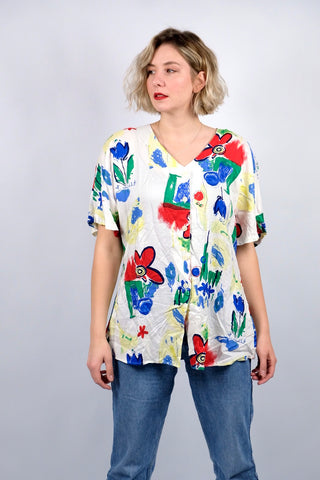 Weiße 90s Bluse aus reiner Viskose mit Crazy Pattern Print in Blau, Rot, Grün und Gelb – wir empfehlen die Bluse einer heutigen L bis 3XL (40 bis 46) je nach gewünschter Passform (bitte Maße beachten)